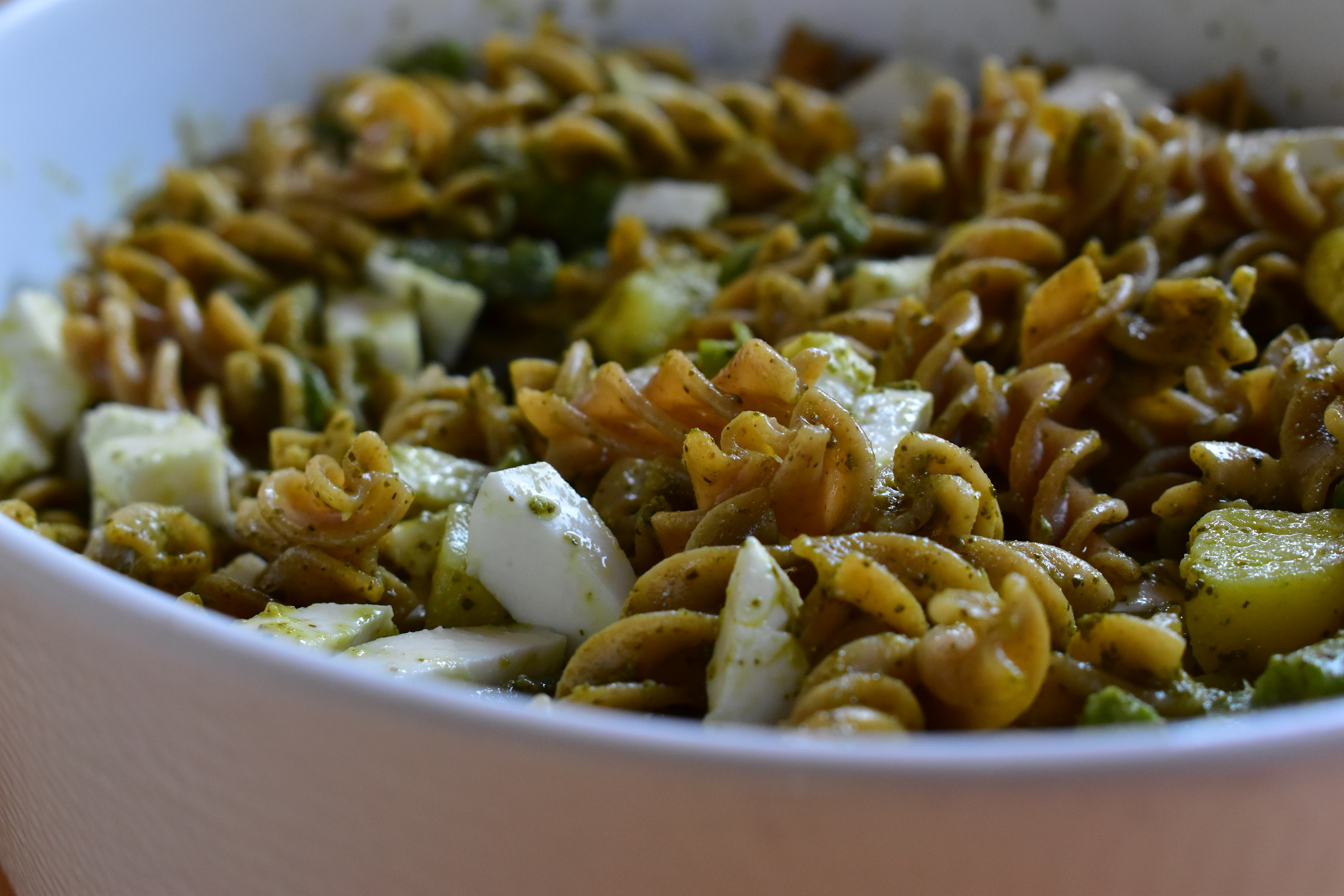 Pesto pasta salad with potatoes, mozzarella and green beans